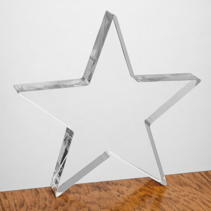 Stern Kontur gelasert aus transparentem Acrylglas, Plexiglas auf Holz